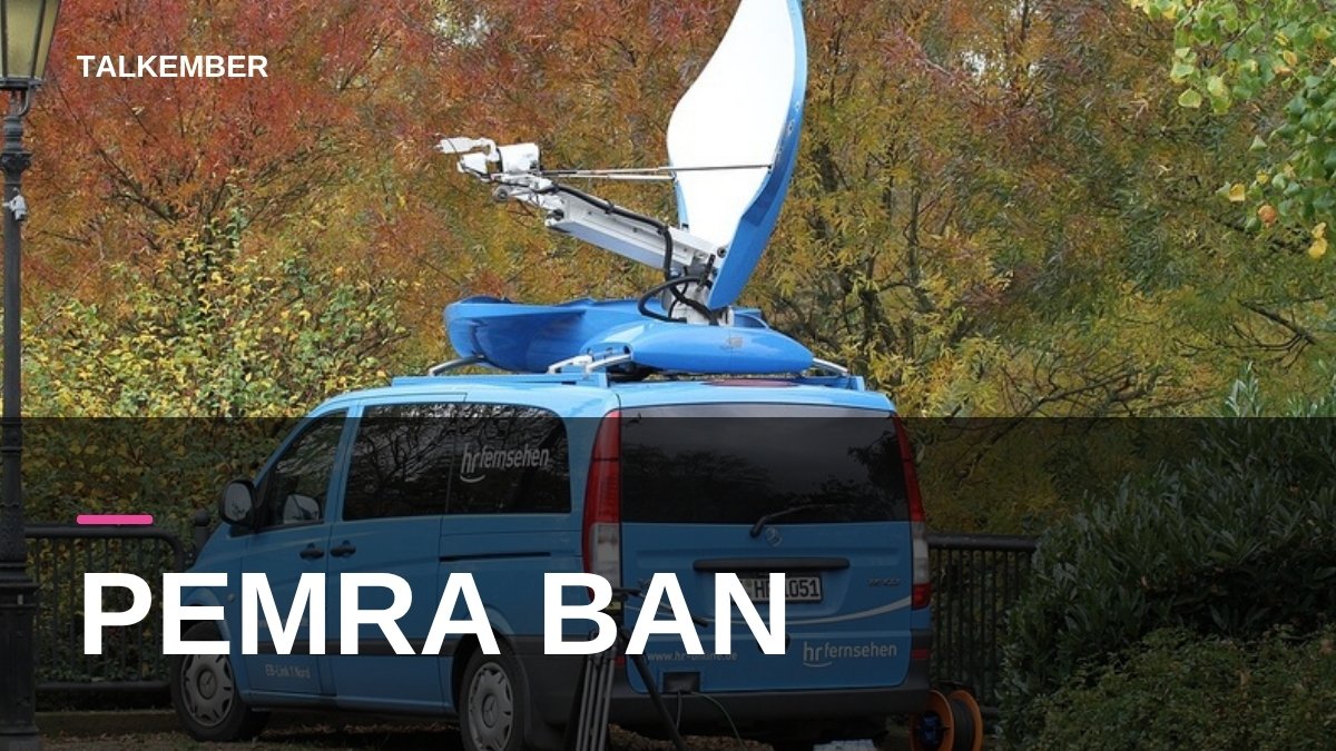 A TV satellite news-gathering van with its dish raised, parked in a park (file photo, 2014, Germany)